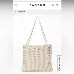 NWT crochet white shoulder bag with zipper closure, brand new still in packaging